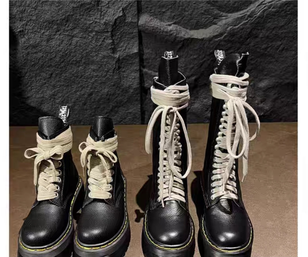 2025 trending Martin-style combat boots in black with thick platform sole and contrast laces