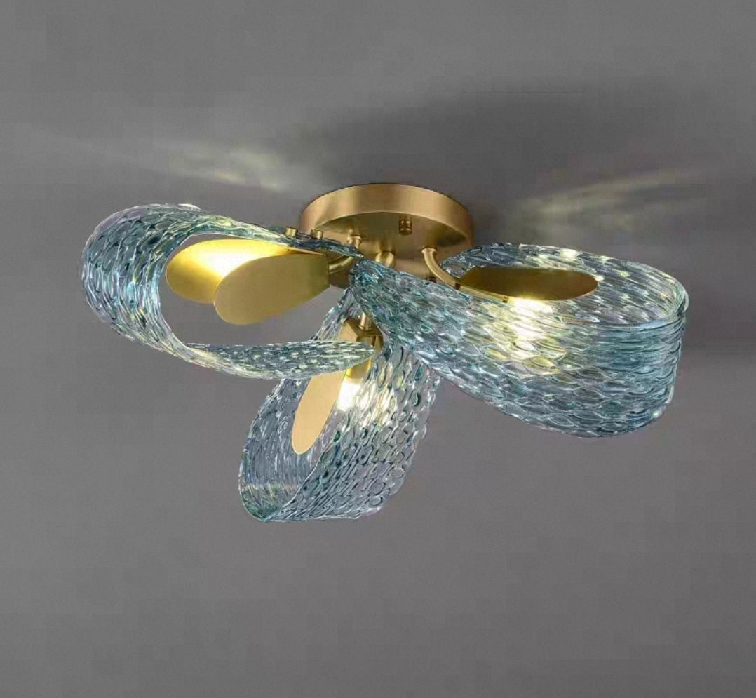 Modern multi-head brass chandelier with adjustable LED colors.