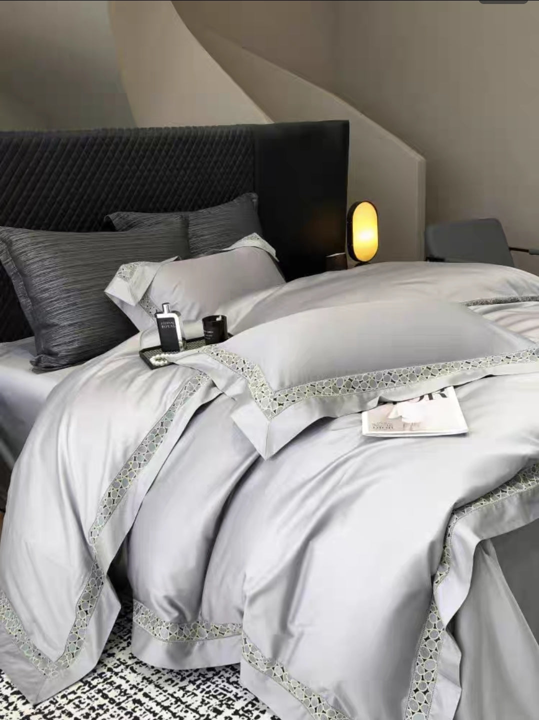 Silver grey luxury cotton bedding set displayed in modern bedroom