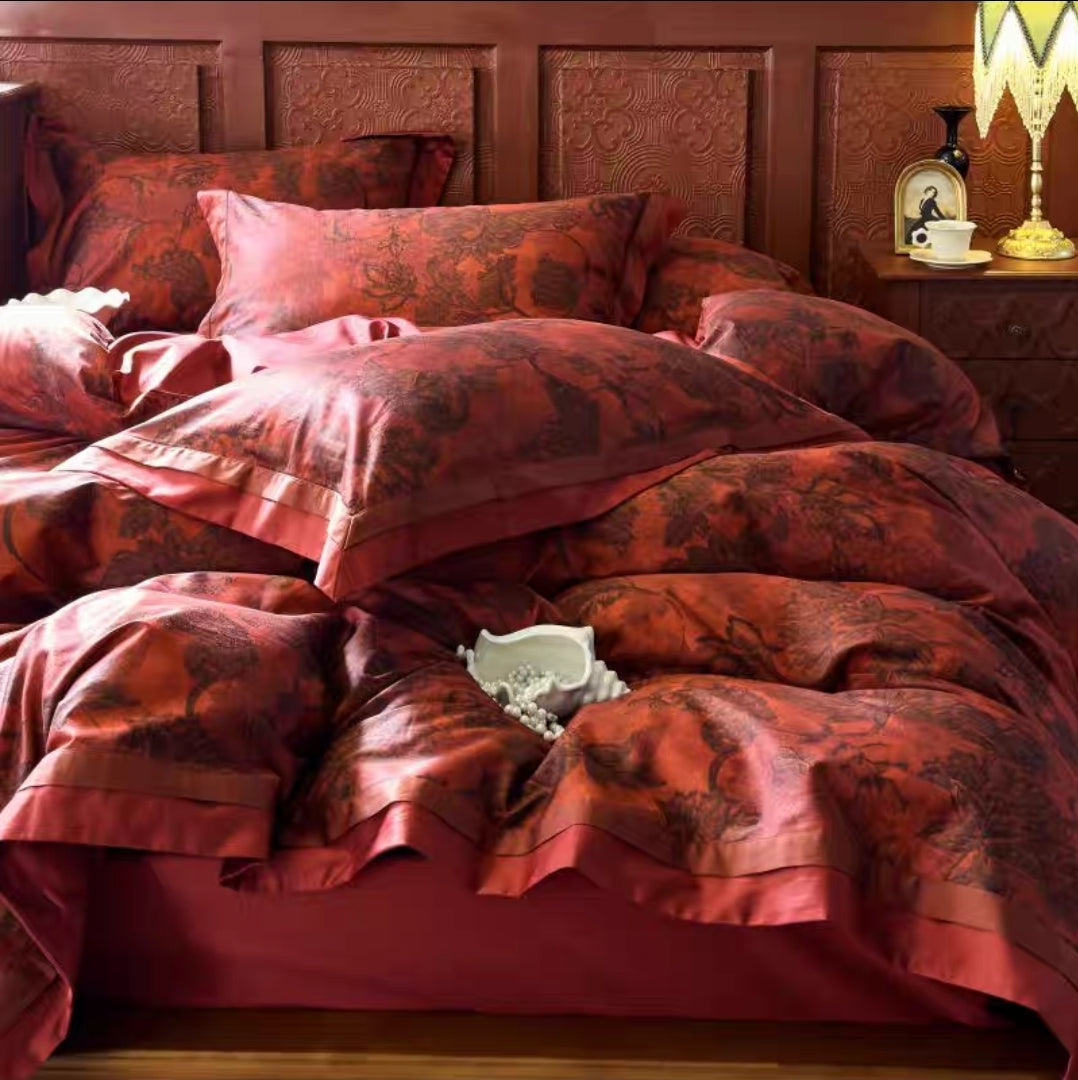 4-piece red floral duvet cover set styled in an elegant wooden bedroom.