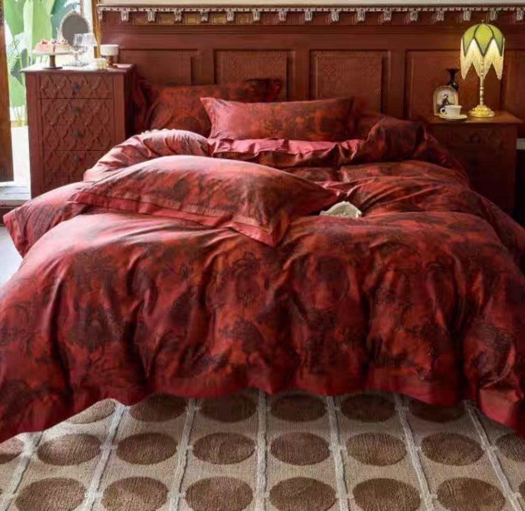 Close-up of red jacquard floral patterns on premium cotton duvet cover.