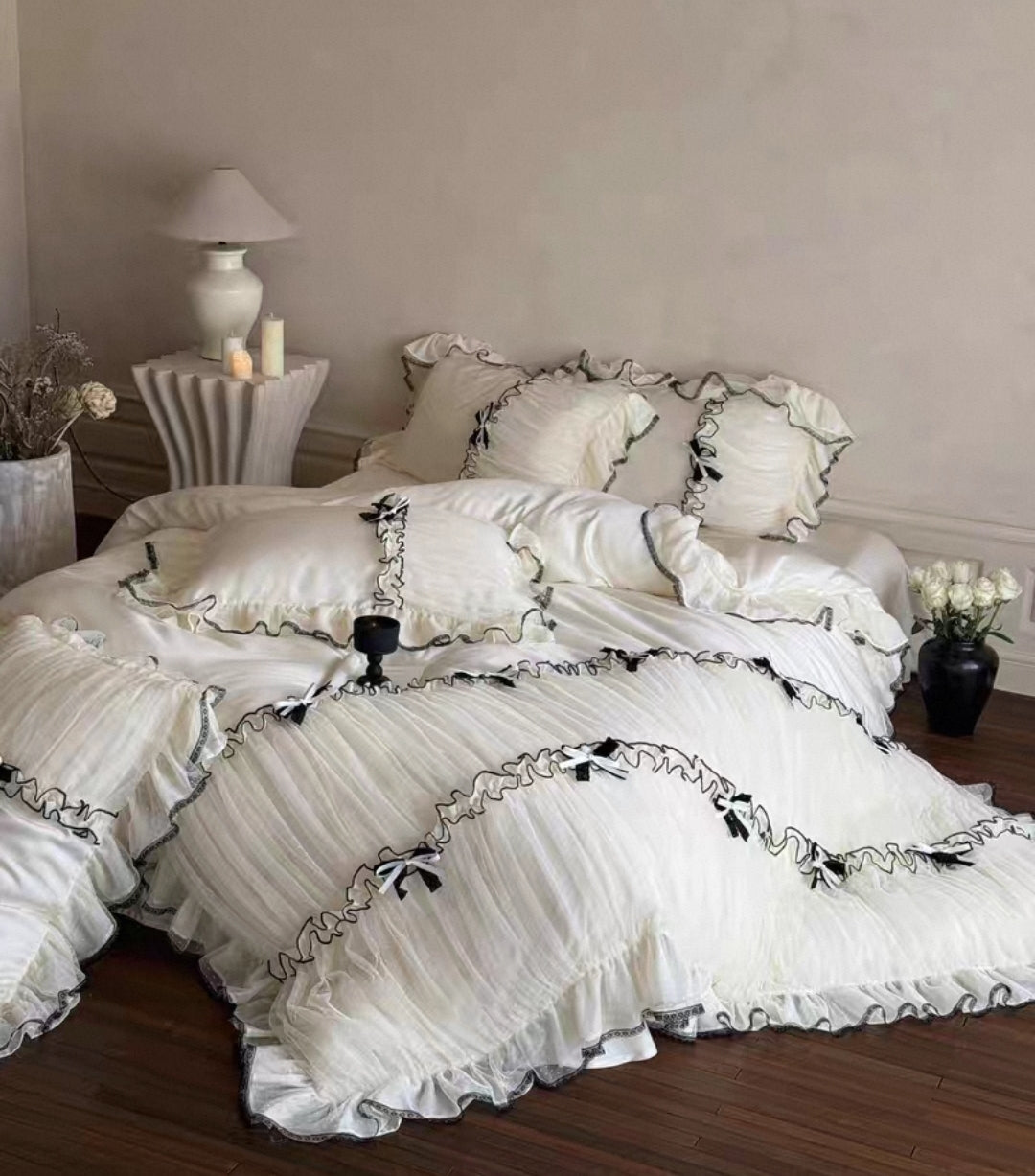 Elegant vintage bedroom featuring a Tencel silk ruffled bedding set.