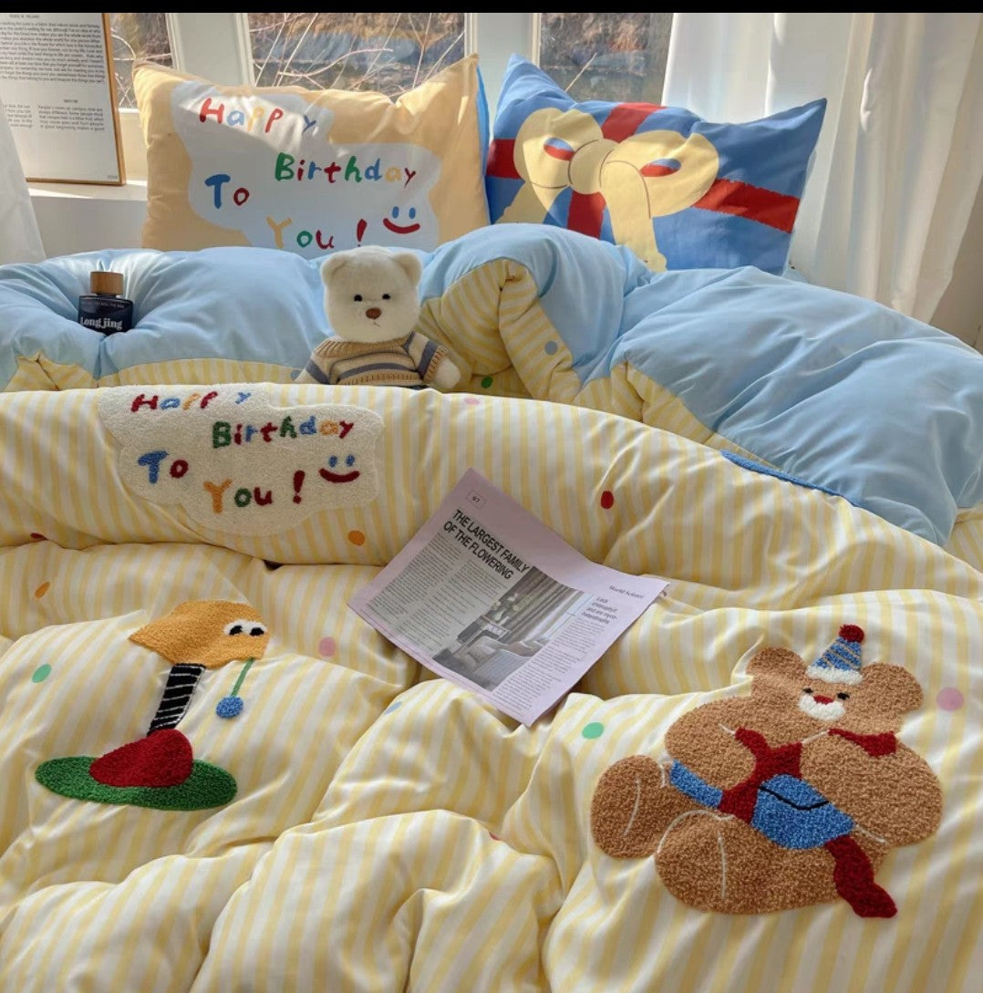 Children's cotton cartoon bedding set in a bedroom with teddy bear-themed bedding and pillows.