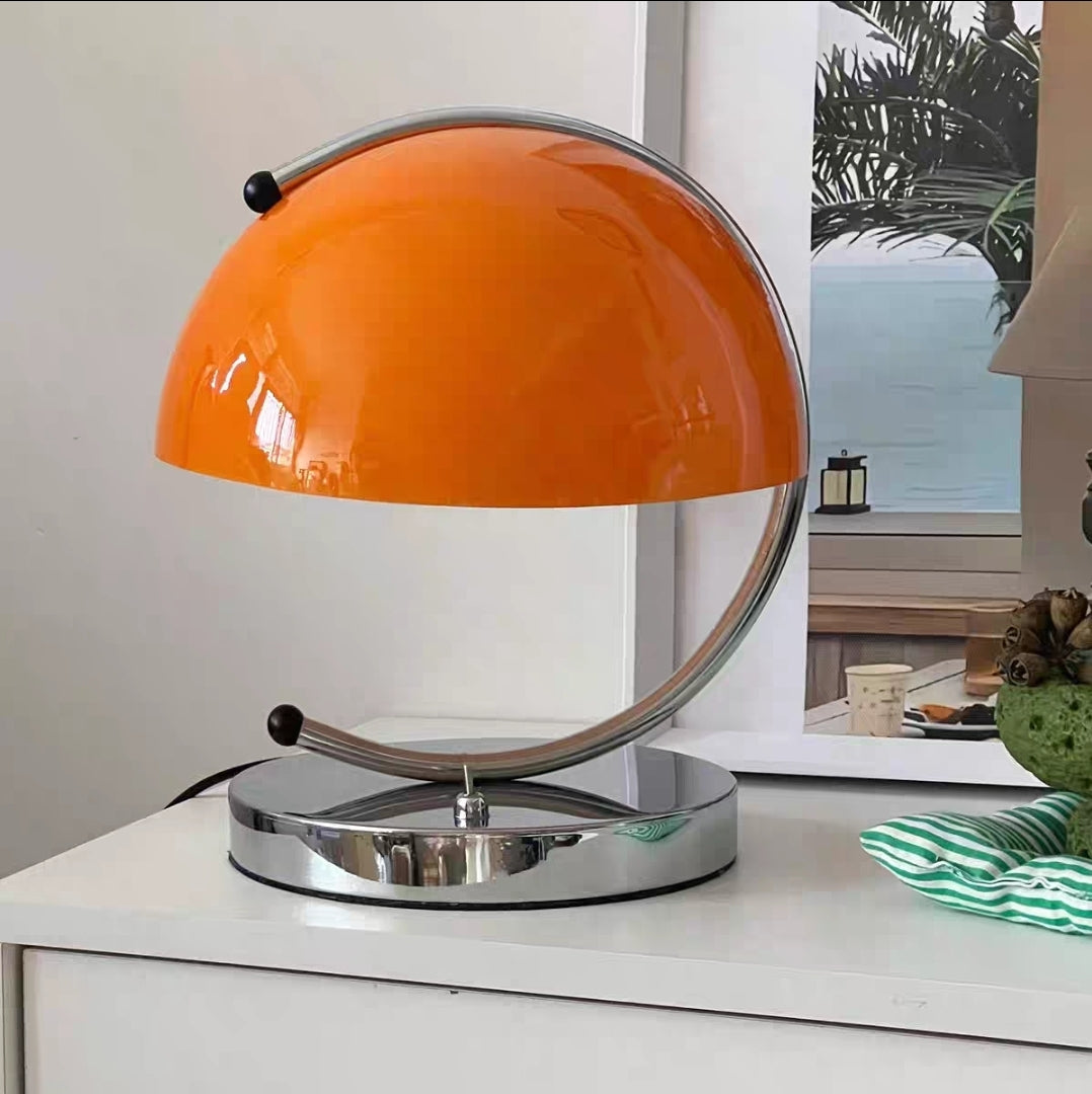 Small orange mini retro mushroom table lamp with curved chrome base and glass dome, 25cm