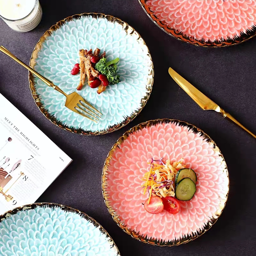 Flat Lay of Nordic Ceramic Plates in Blush, Aqua, and Midnight Bloom Colors