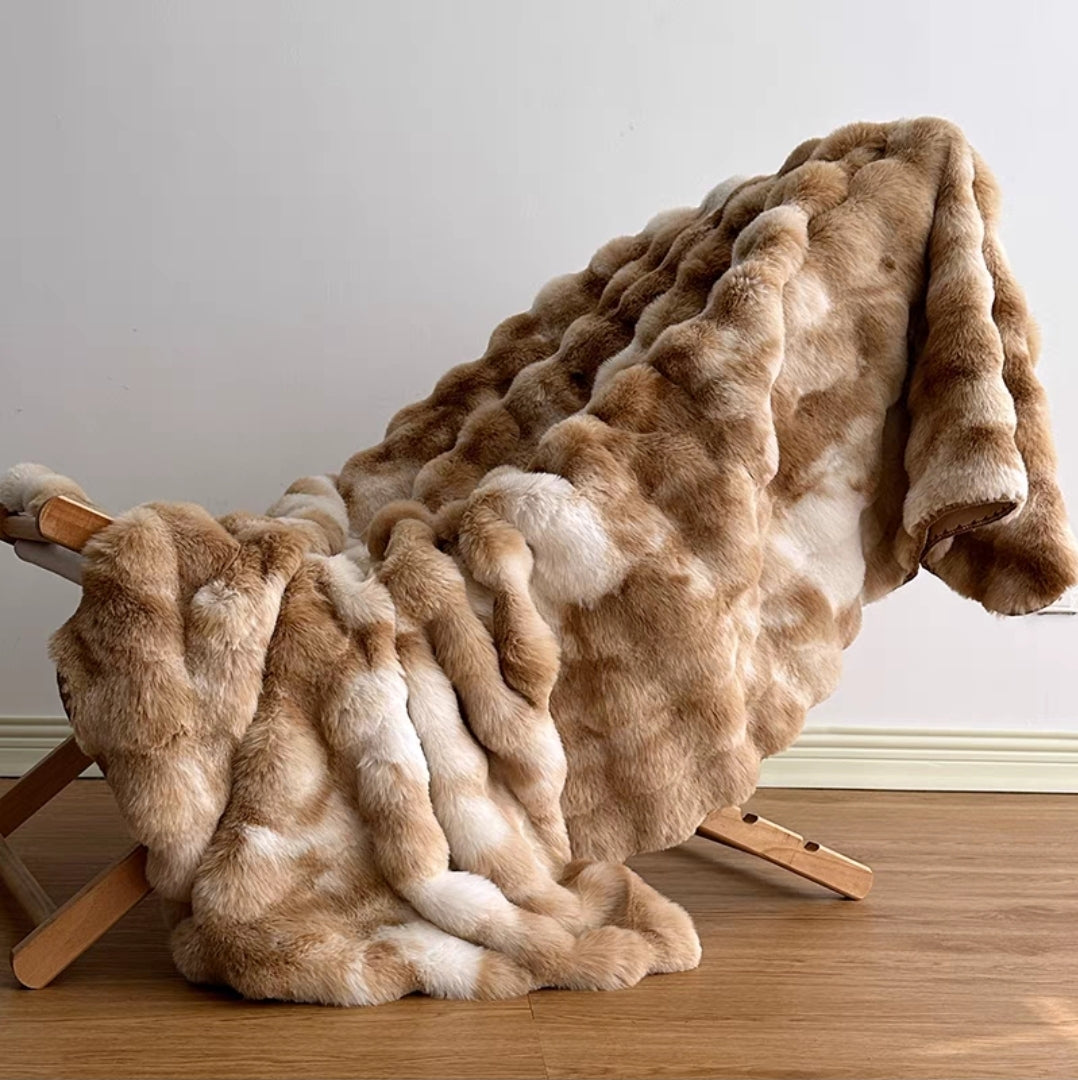 Taupe Brown Faux Rabbit Fur Throw Blanket Draped on Wooden Chair