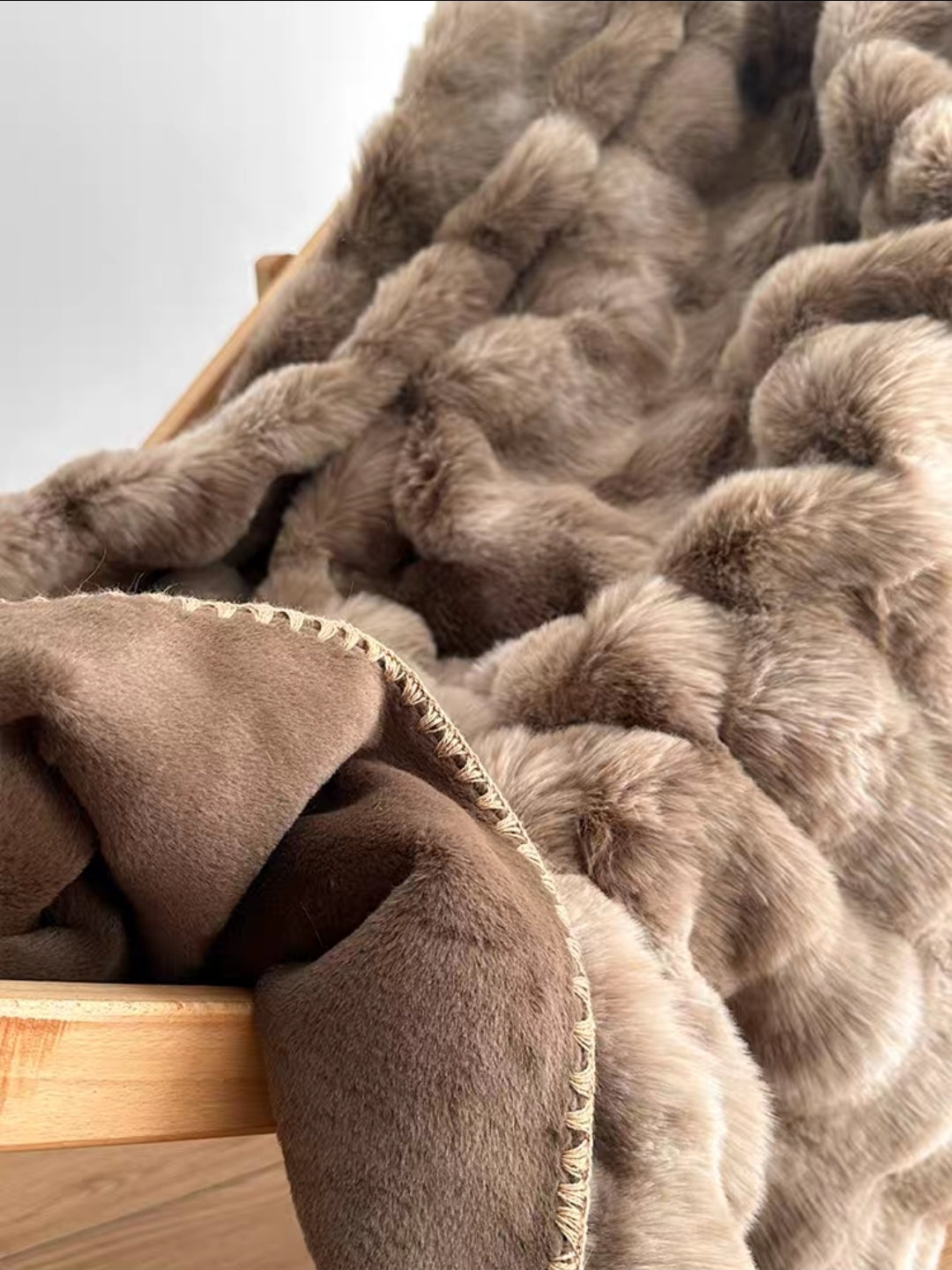 Faux Rabbit Fur Blanket Folded to Display Double-Sided Plushness