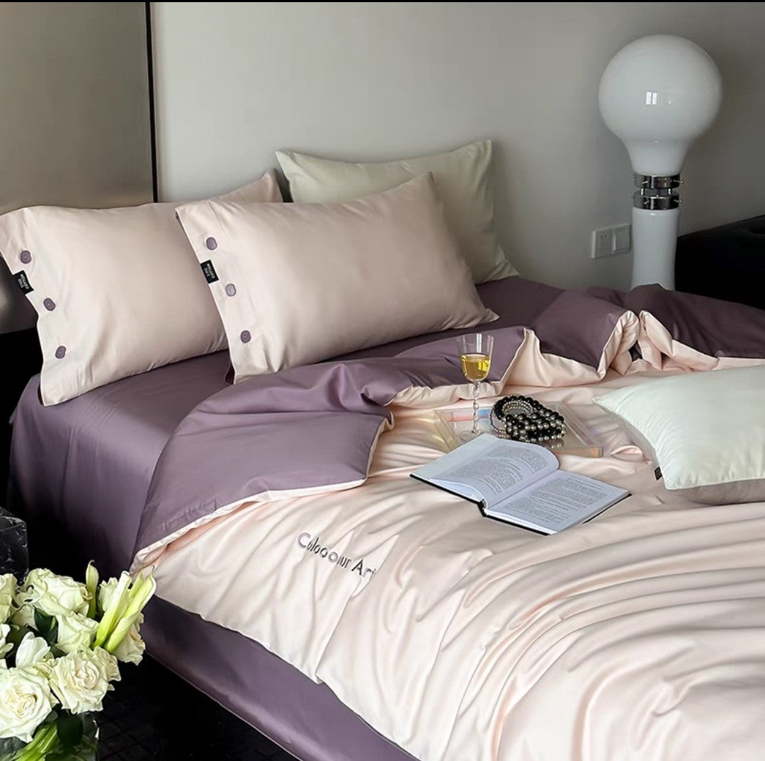 Blush & Mauve Duvet Cover Set with Pillowcases on Modern Bed