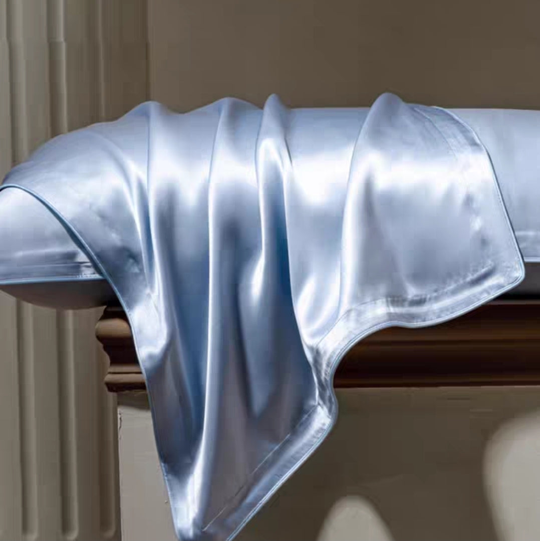 Elegant silk pillow set with moisture-wicking back panel design