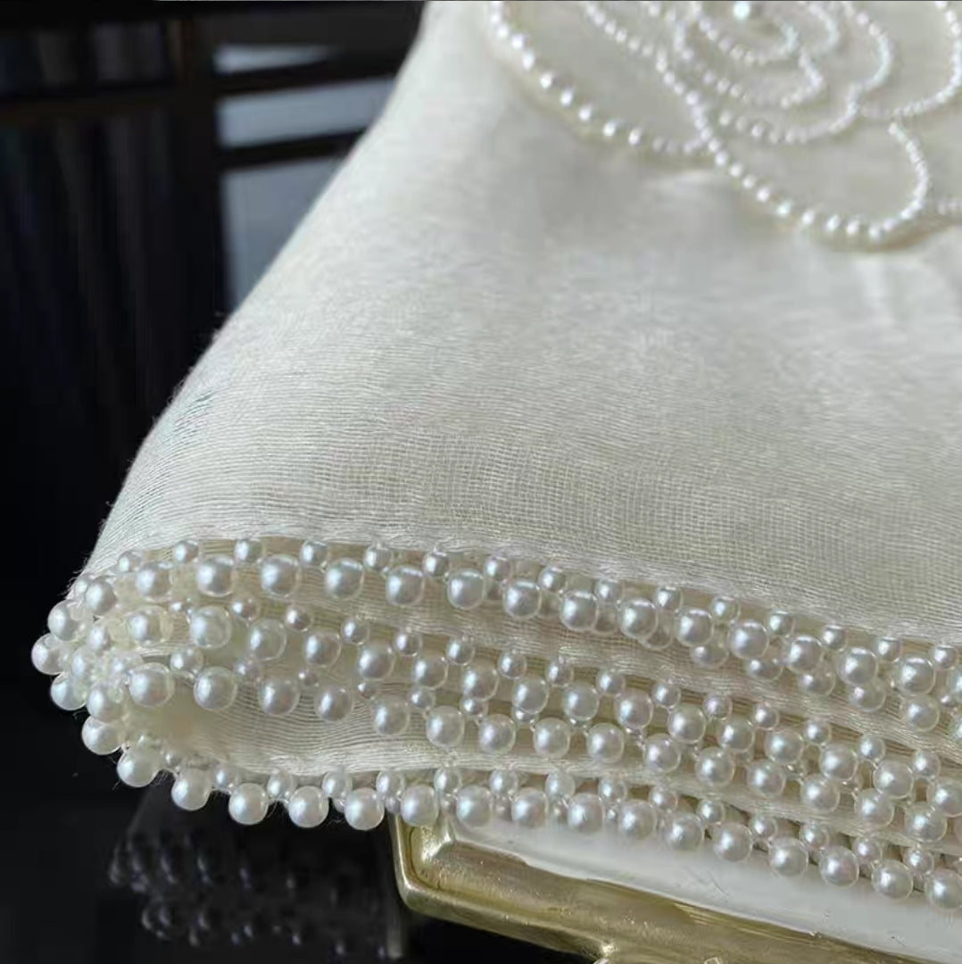 Elegant gift-wrapped camellia embroidered shawl, perfect for special occasions.