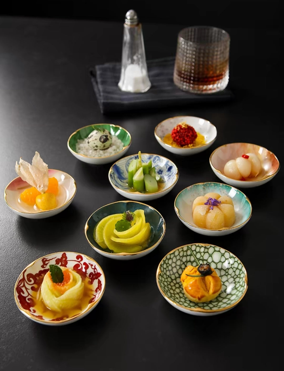 Top View of Full Set with Drinks
"Chinese-style appetizer set with 8 colorful mini bowls, black serving tray, and glassware for restaurant dining.