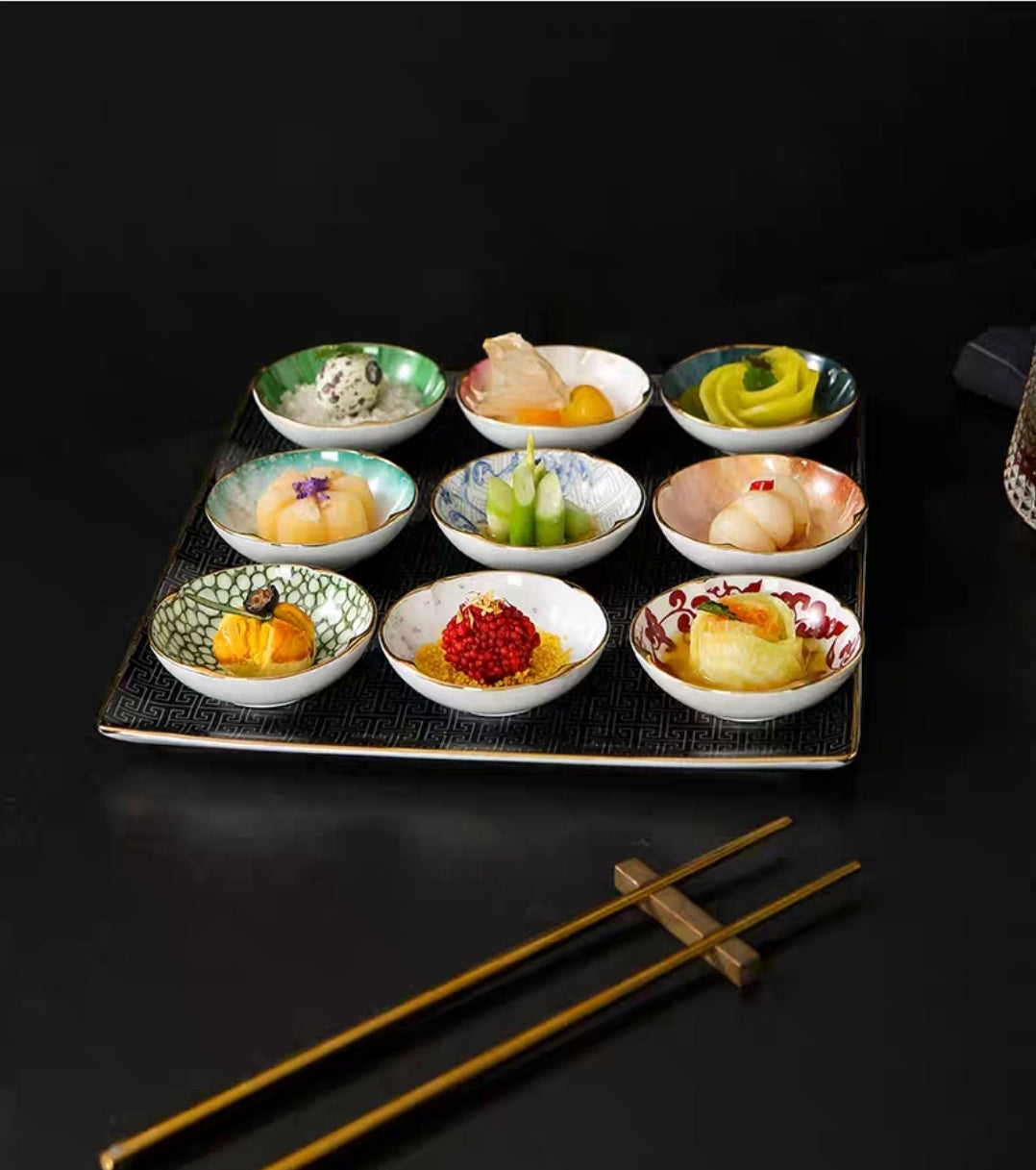 Multi-Color Glazed Bowl Set
Assorted color-glazed ceramic bowls on black tray, perfect for condiments, desserts, and tasting menus