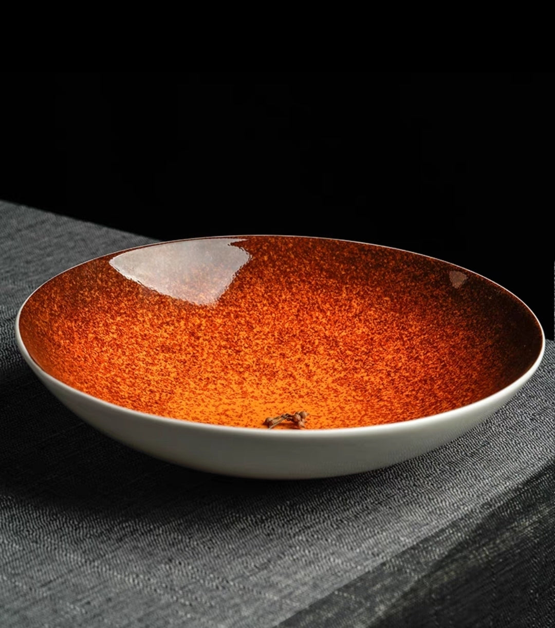 Elegant glazed bone china plate used for fine dining table display and serving