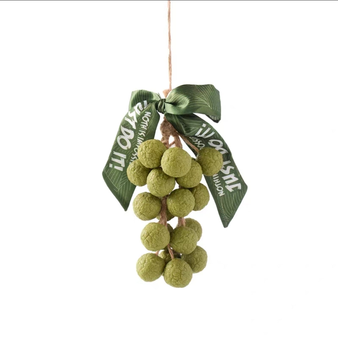 Lychee Cluster Scented Soap Ornament  hanging olive branch with a green ribbon on a white background