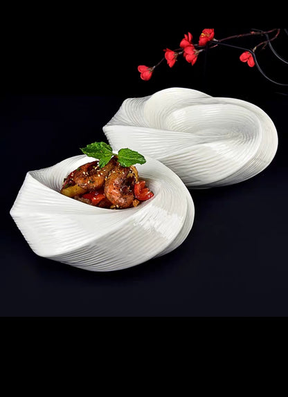 Curved ripple-edge ceramic bowl for luxury plating


