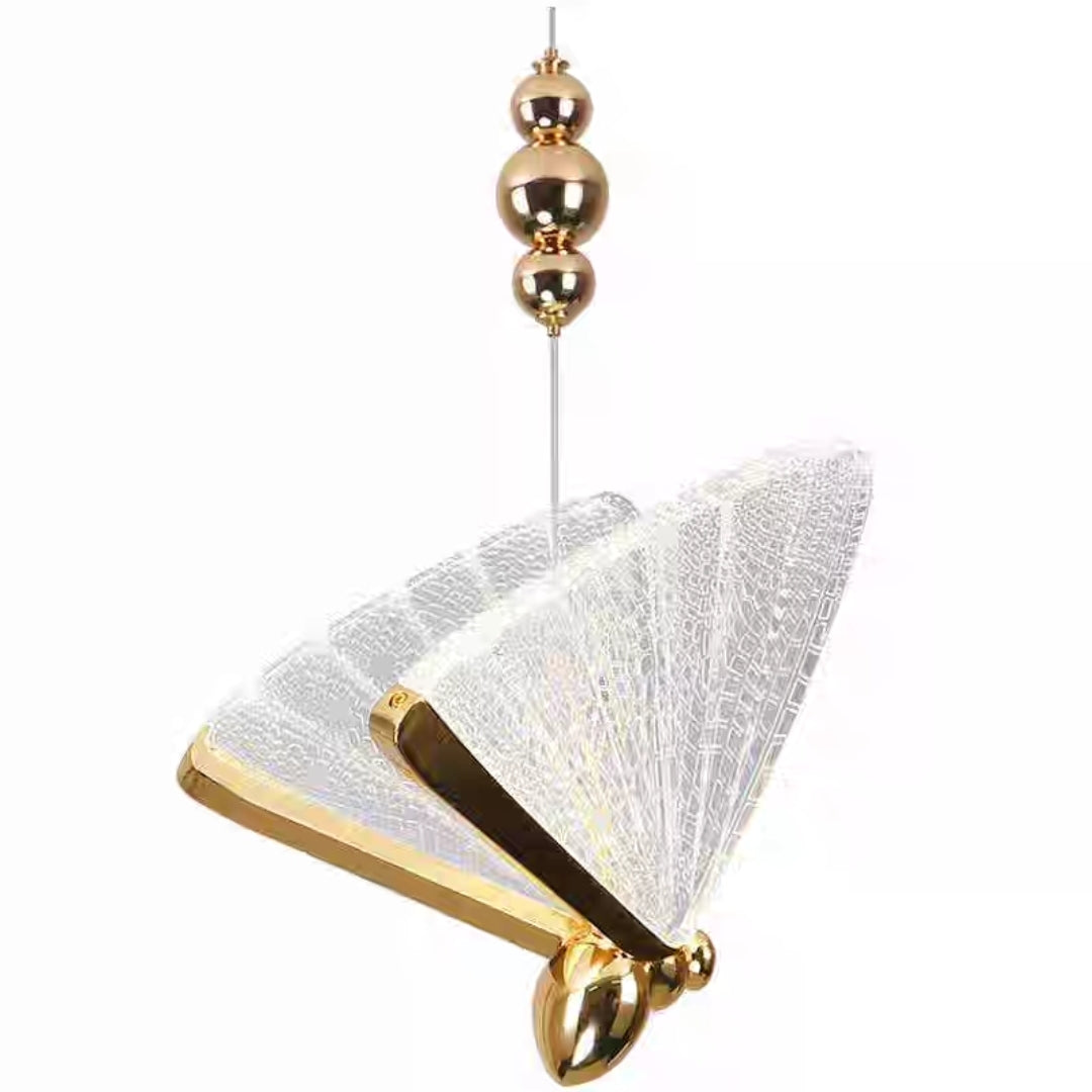 Decorative light fixture with gold accents on a white background