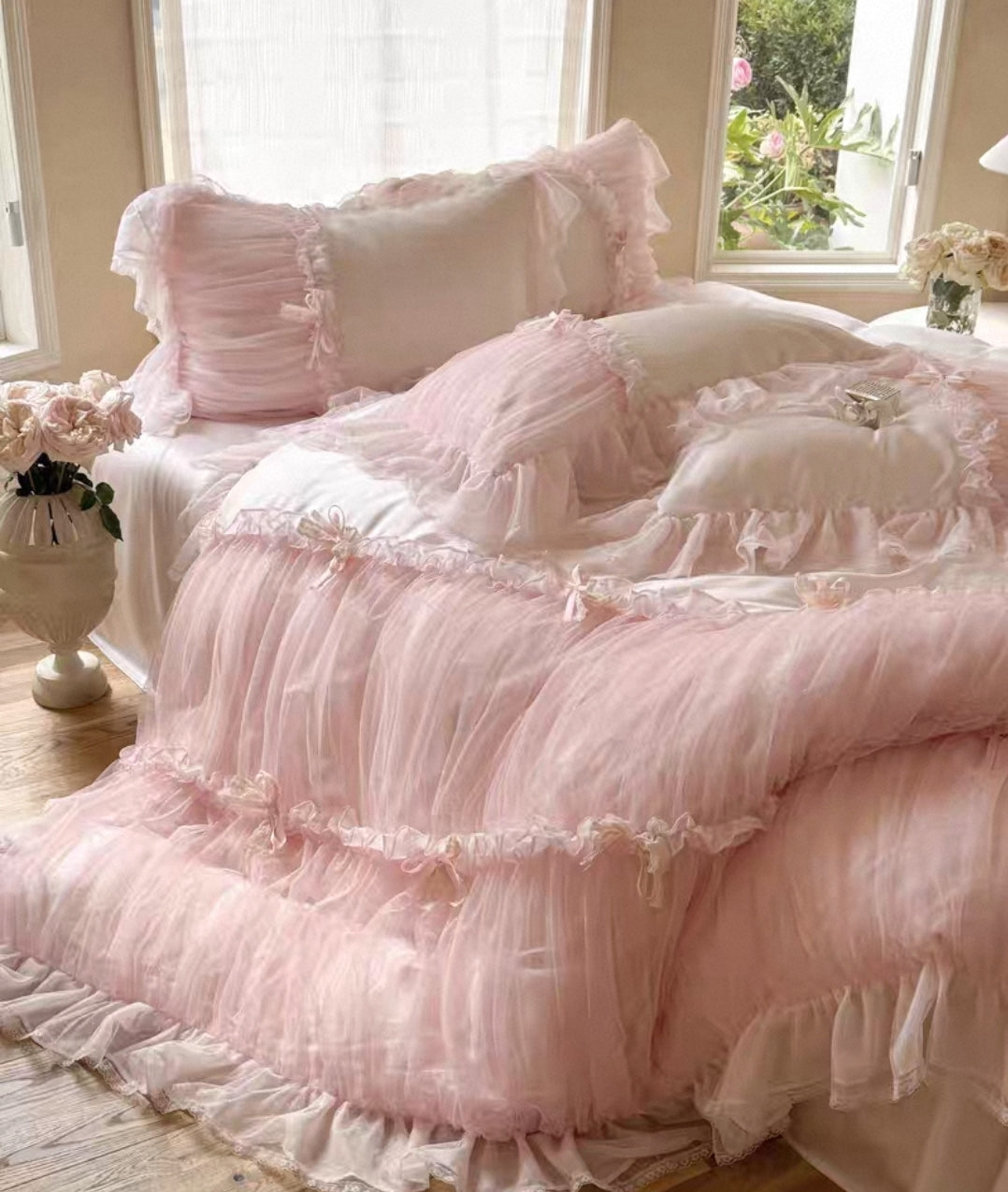 Pink ruffled duvet cover set with lace overlays and ruched detailing