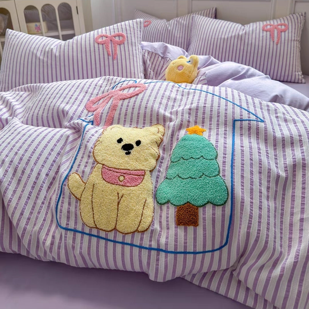 Children's pillowcase with teddy bear and tree design on a striped background