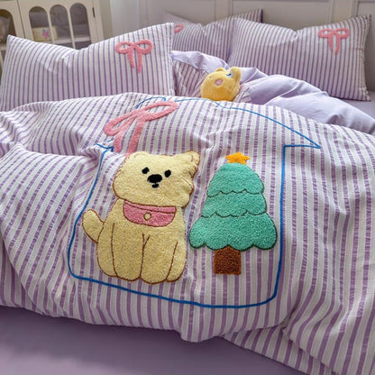 Children's pillowcase with teddy bear and tree design on a striped background