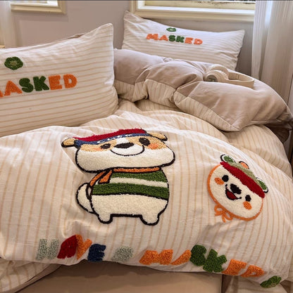 Bedding set with cartoon character design and 'MASKED' text on pillows