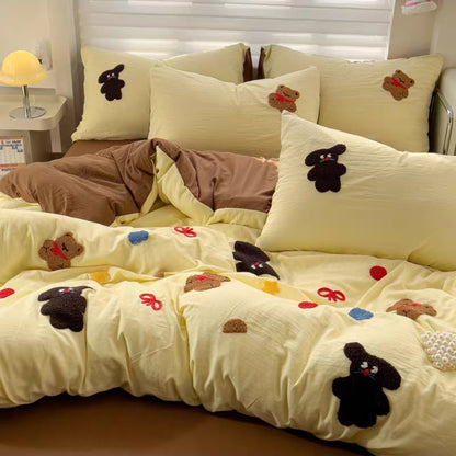 Cotton cartoon Bedding set with plush animal appliqués on a bed in a bedroom setting.