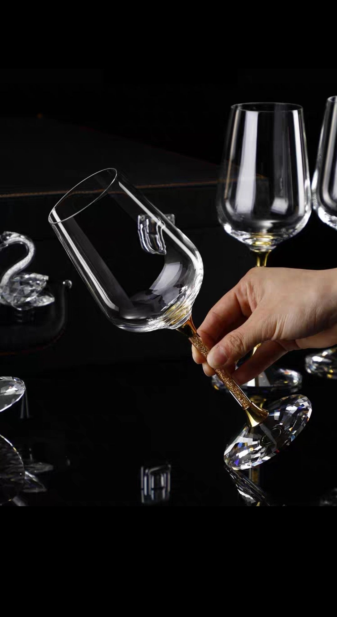 Premium gift box containing hand-blown crystal glassware and wine accessories