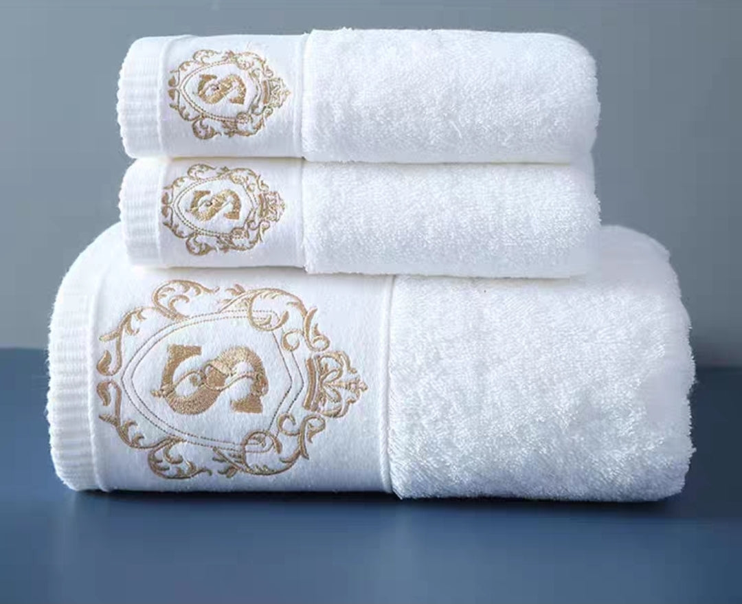 Premium cotton towels stacked with embroidery