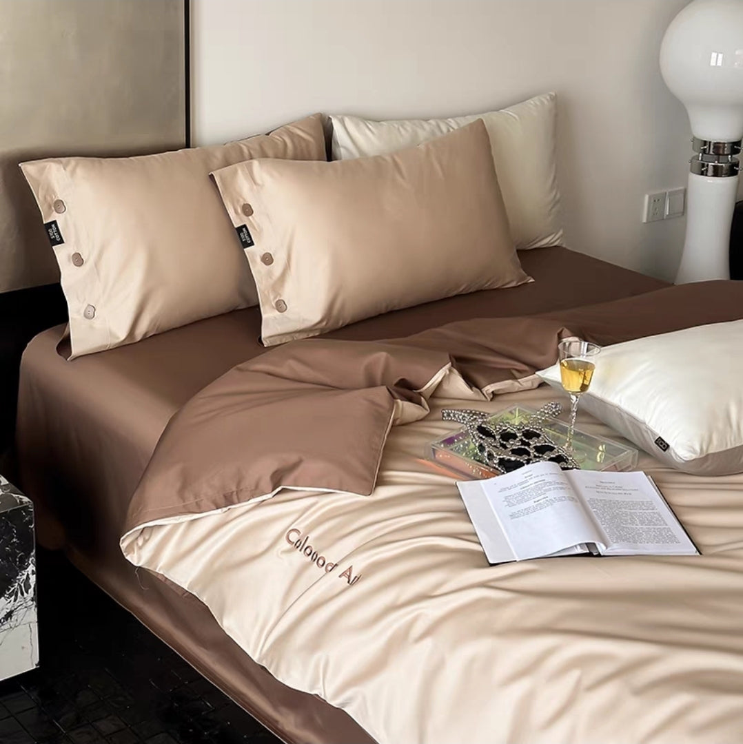 Mocha & Ivory Duvet Cover Set on Contemporary Bed with Warm Tones