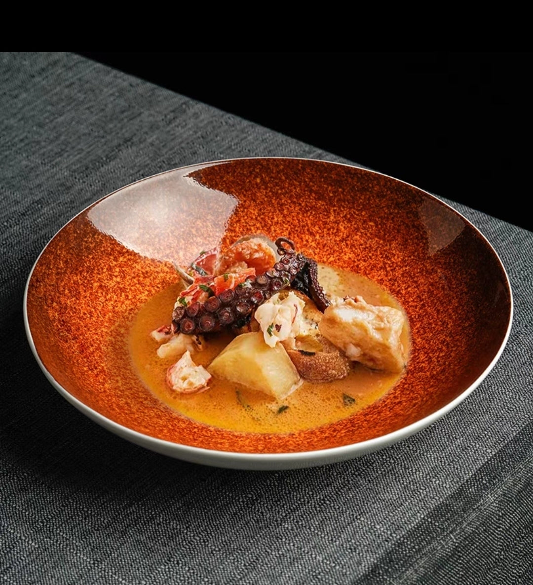 Deep-rim glazed bone china plate styled for gourmet culinary presentation