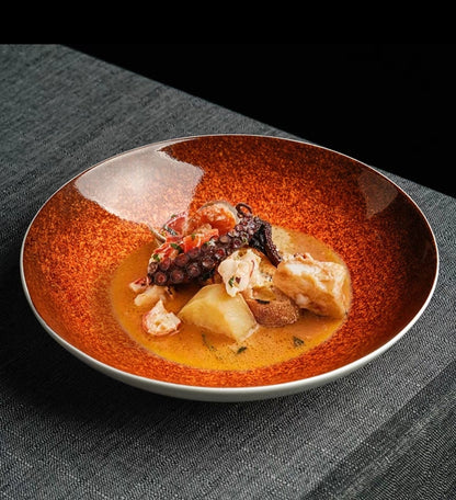 Deep-rim glazed bone china plate styled for gourmet culinary presentation