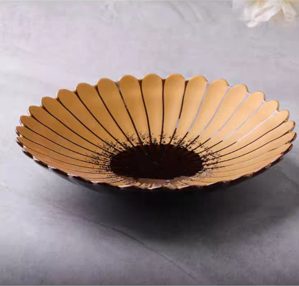 Overhead shot of Japanese floral design ceramic plate with delicate petal-edge finish